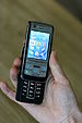 A Nokia 6280 mobile phone (A1-edition), an UMT...